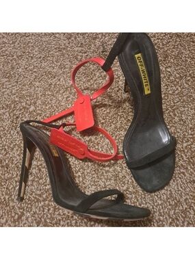 Off-White Black Suede Stiletto Sandals with Red Tag Accent
no longer have box